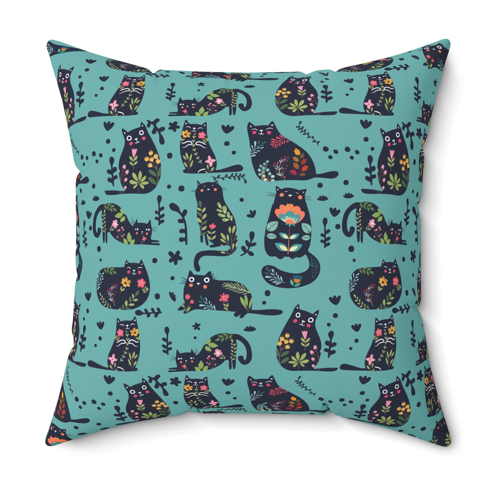 Square throw  pillow with illustrated cartoon cats and floral petal motif on a teal background
