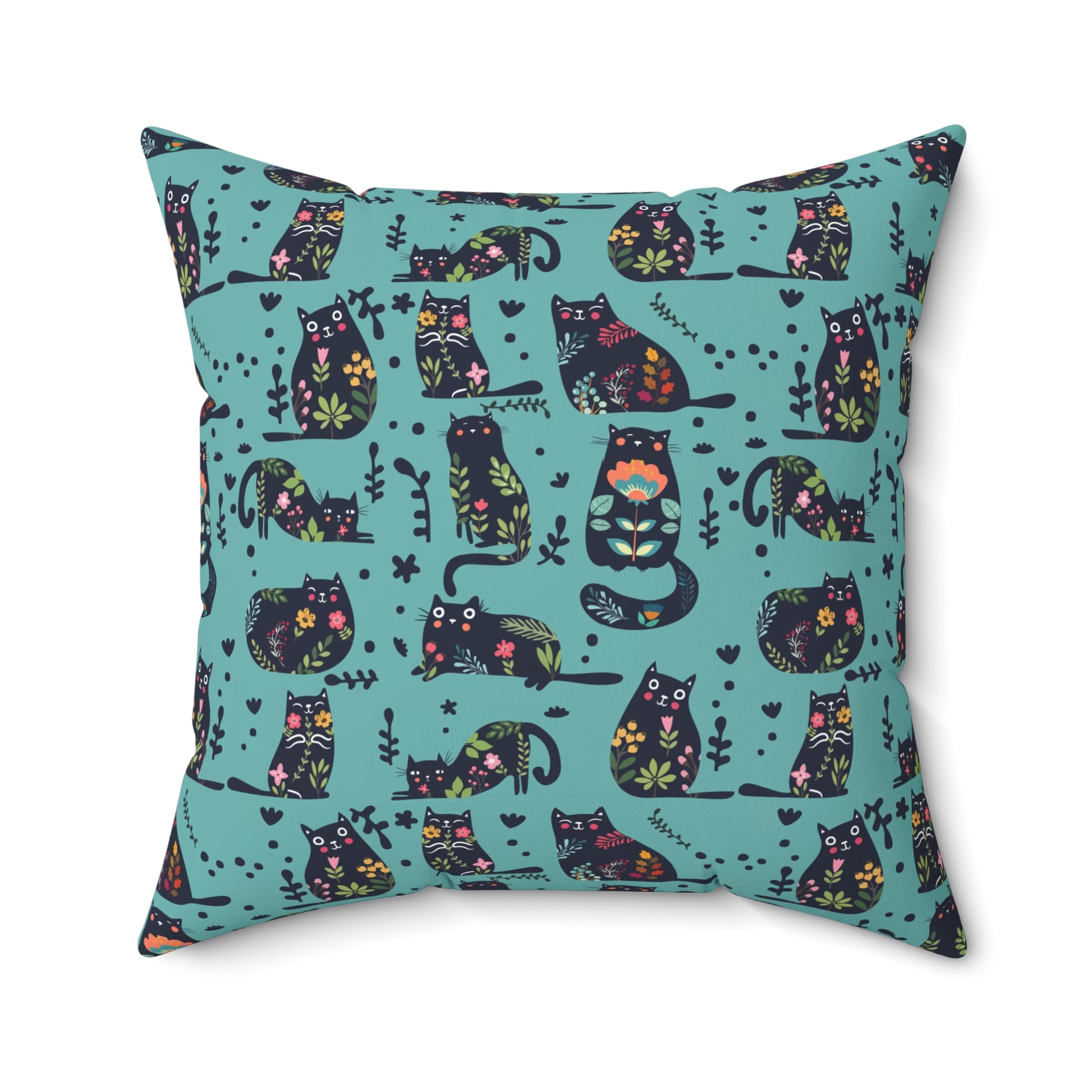 Square throw  pillow with illustrated cartoon cats and floral petal motif on a teal background