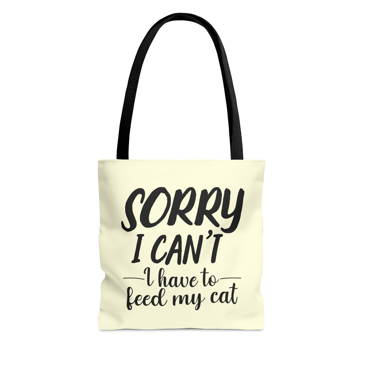 Tote bag with 'Sorry I Can't, I Have to Feed My Cat' text on a cream background