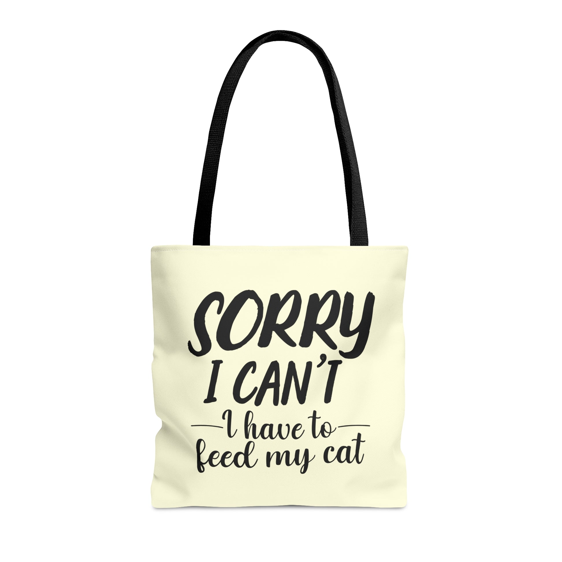 Tote bag with 'Sorry I Can't, I Have to Feed My Cat' text on a cream background