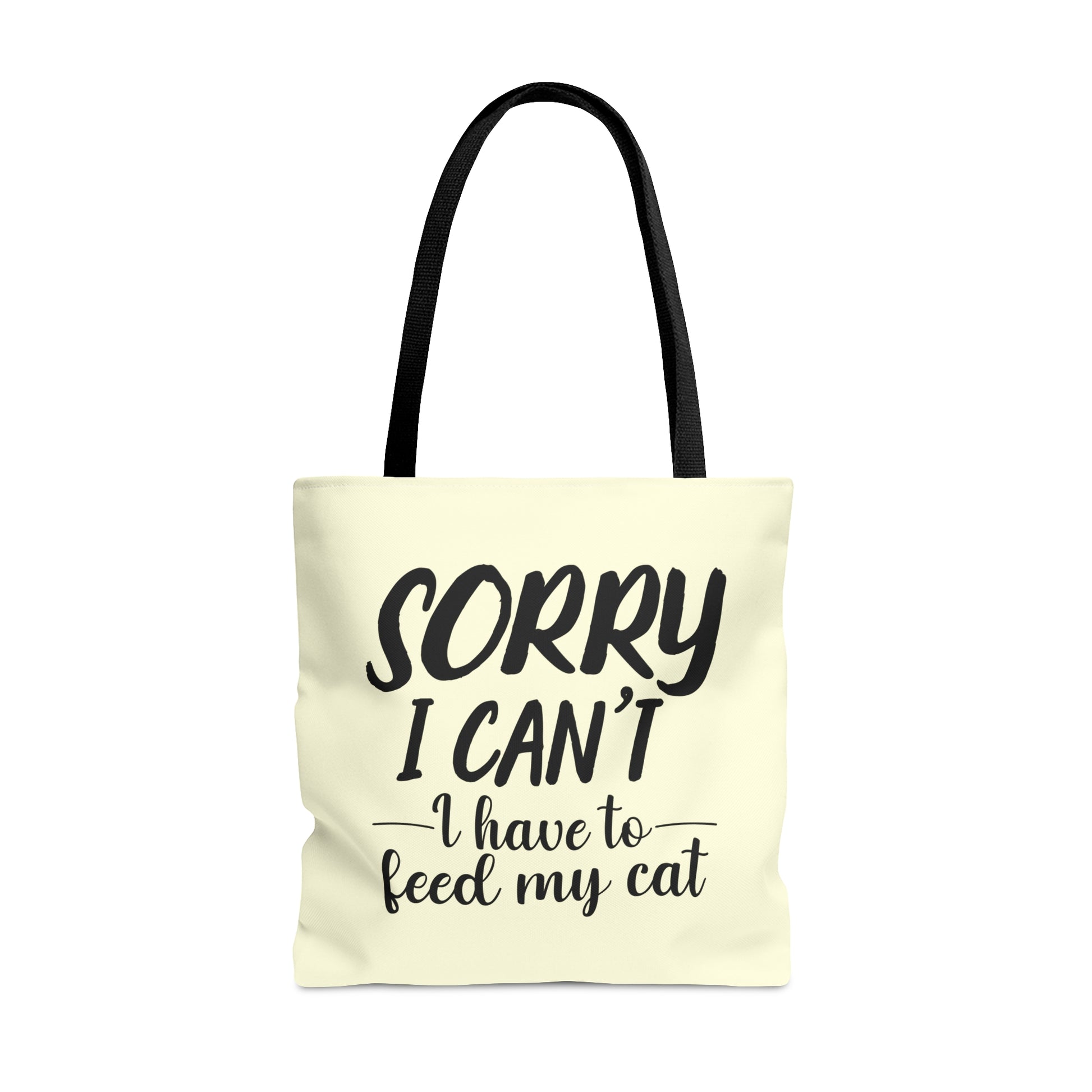 Tote bag with 'Sorry I Can't, I Have to Feed My Cat' text on a cream background