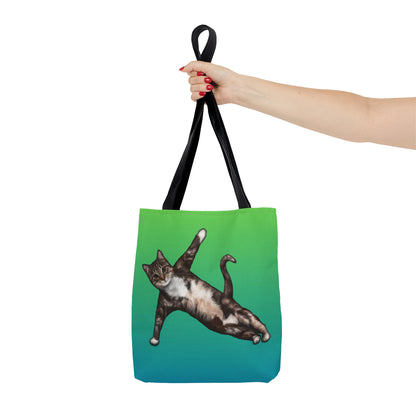 Tote bag with a cat in a yogi pose on a green gradient background