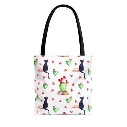Tote bag with black cat, hearts and cactus pattern on a white background