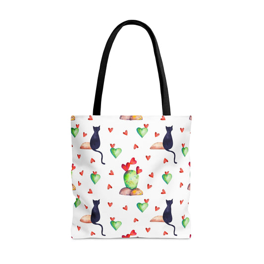 Tote bag with black cat, hearts and cactus pattern on a white background