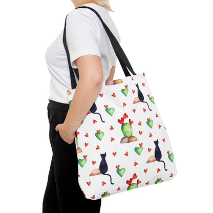 Tote bag with black cat, hearts and cactus pattern on a white background