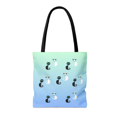 Tote bag with the text "Sorry I'm Late My Cat Was Sitting On Me" and black and white cat illustrations. 