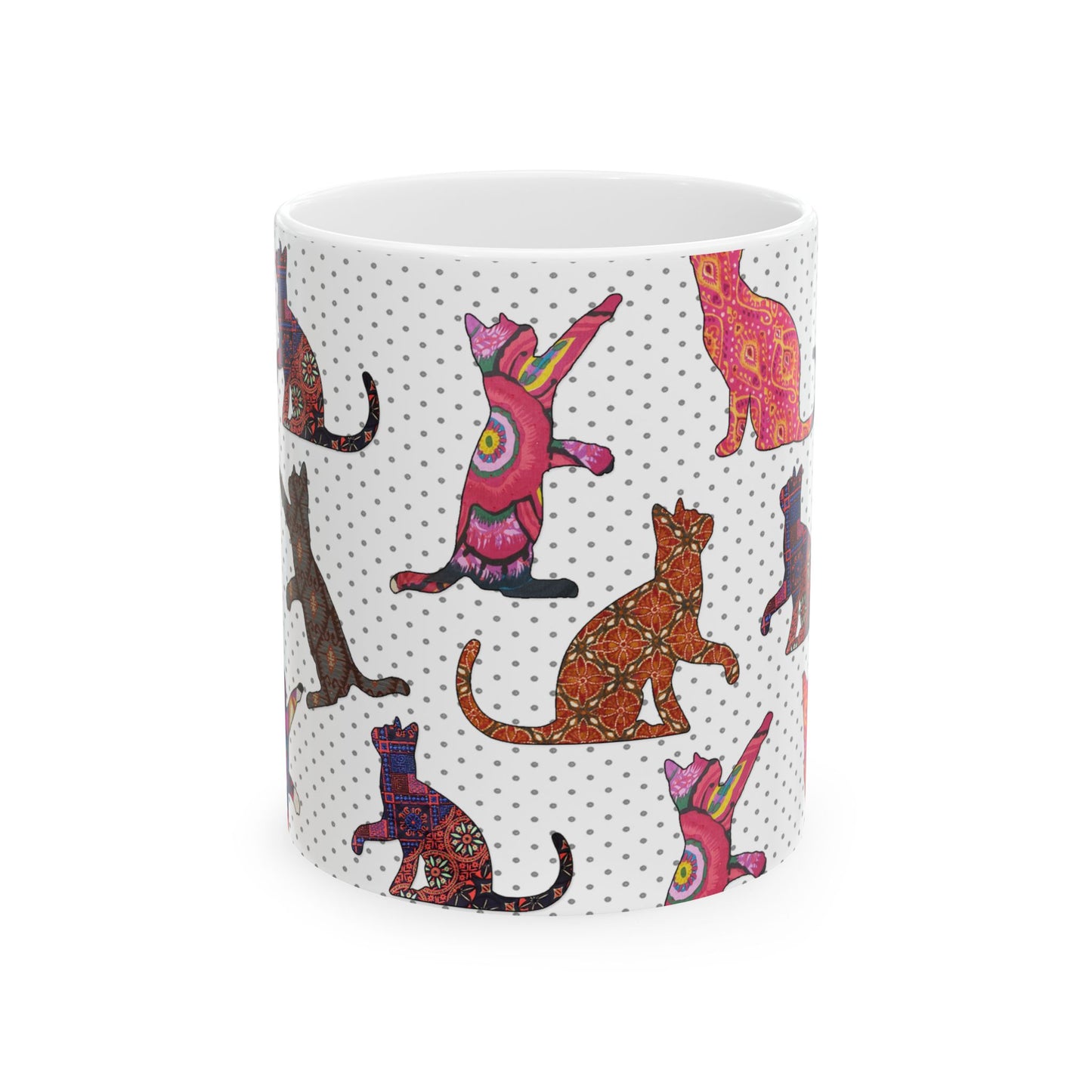 White mug with colorful cat pattern. 