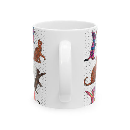 White mug with colorful cat pattern. 