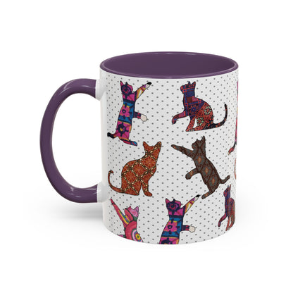 Purple mug with colorful cat silhouette pattern.