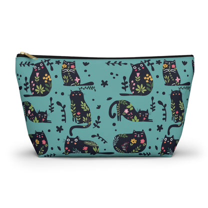 A blue cosmetic and toiletry bag with an abstract pattern featuring black cats and floral design. Cosmetic, makeup, toiletry, travel, pencil case & everyday bag for cat lovers.
