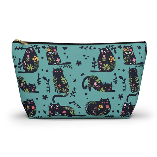 A blue cosmetic and toiletry bag with an abstract pattern featuring black cats and floral design. Cosmetic, makeup, toiletry, travel, pencil case & everyday bag for cat lovers.