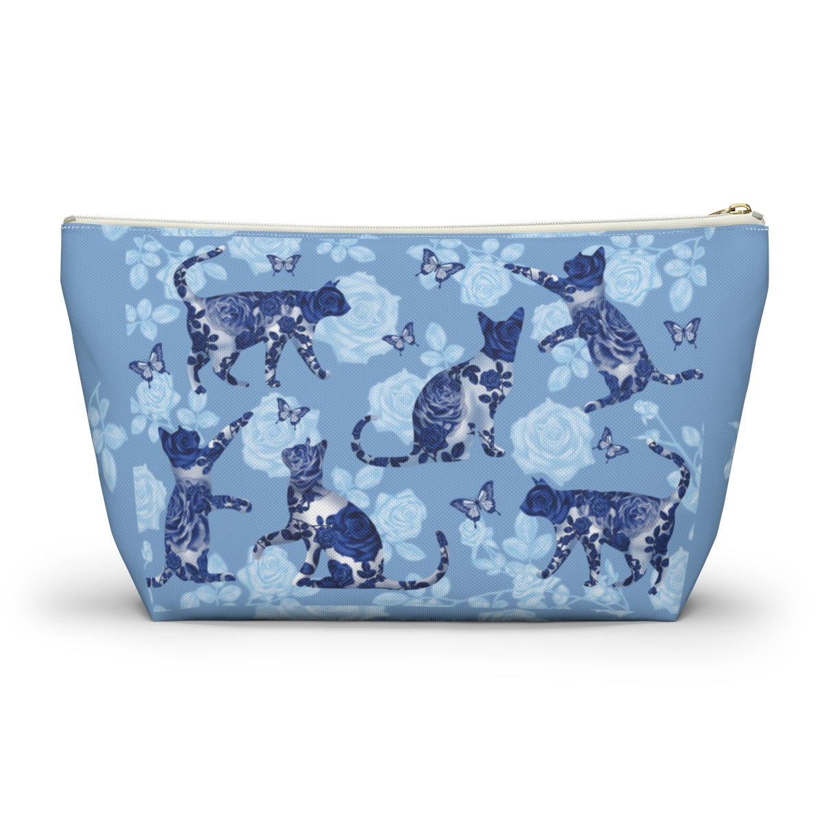 A floral blue accessory bag with a pattern of kitty silhouettes, roses, and butterflies, featuring a zipper closure. Cosmetic, makeup, toiletry, travel, pencil case & everyday essentials bag for cat lovers.