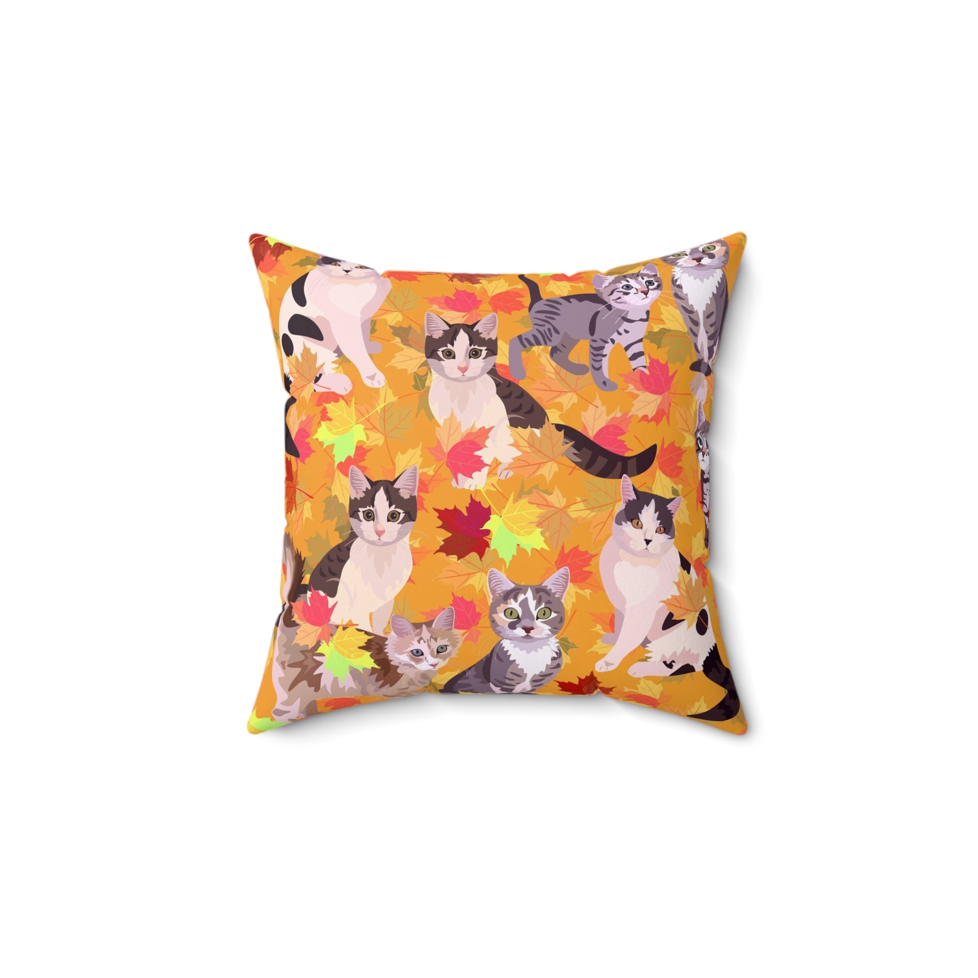 A square-shaped throw pillow with a fall leaves pattern, featuring various cartoon cats among the leaves.