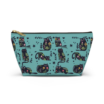 A blue cosmetic and toiletry bag with an abstract pattern featuring black cats and floral design. Cosmetic, makeup, toiletry, travel, pencil case & everyday bag for cat lovers.